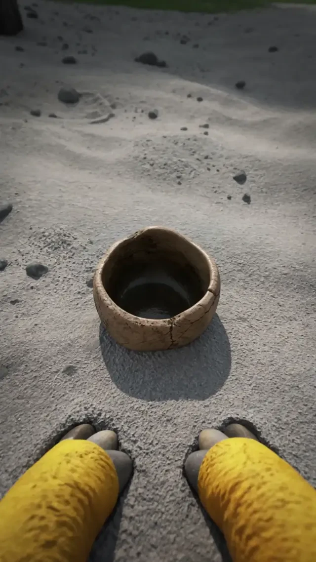 Finalbild — die Tasse fängt am Oasenteich Wasser